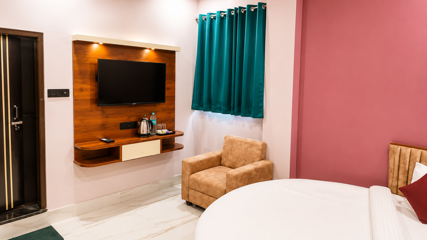 Premium Room TV wall at Asha Palace